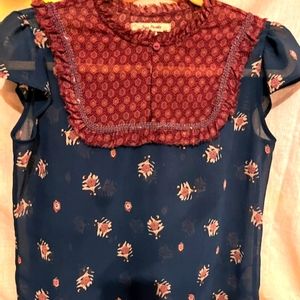 Free People top Size Medium can be worn as small